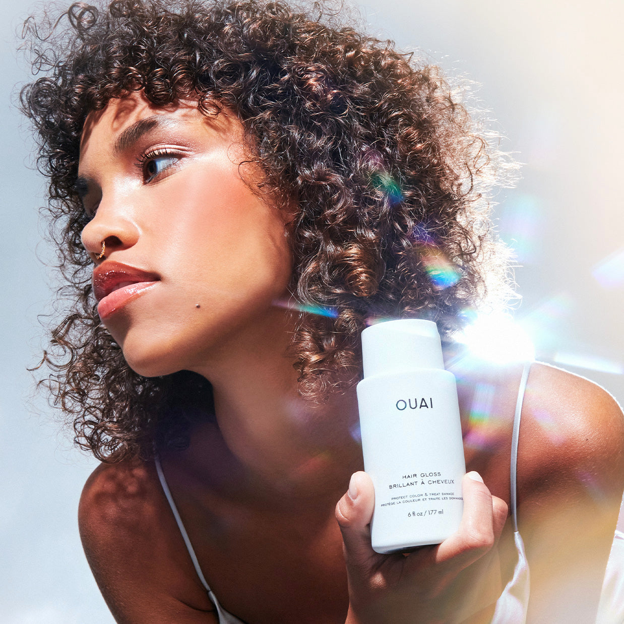Model with Hair Gloss and rainbow reflect