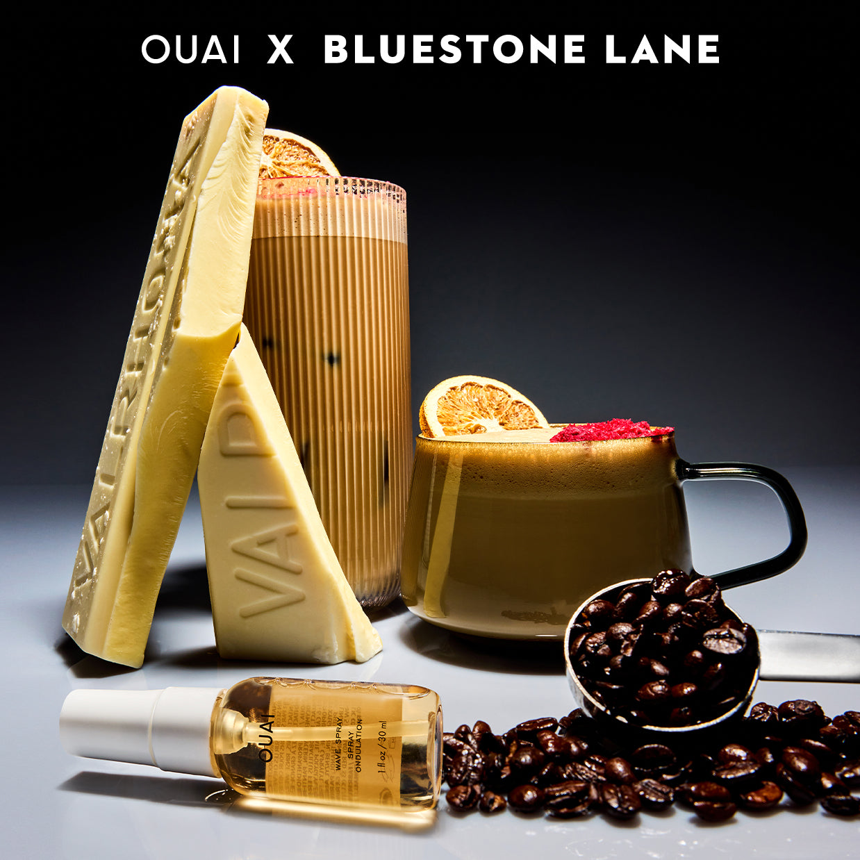 two coffees and wave spray with OUAI and Bluestone lane logo