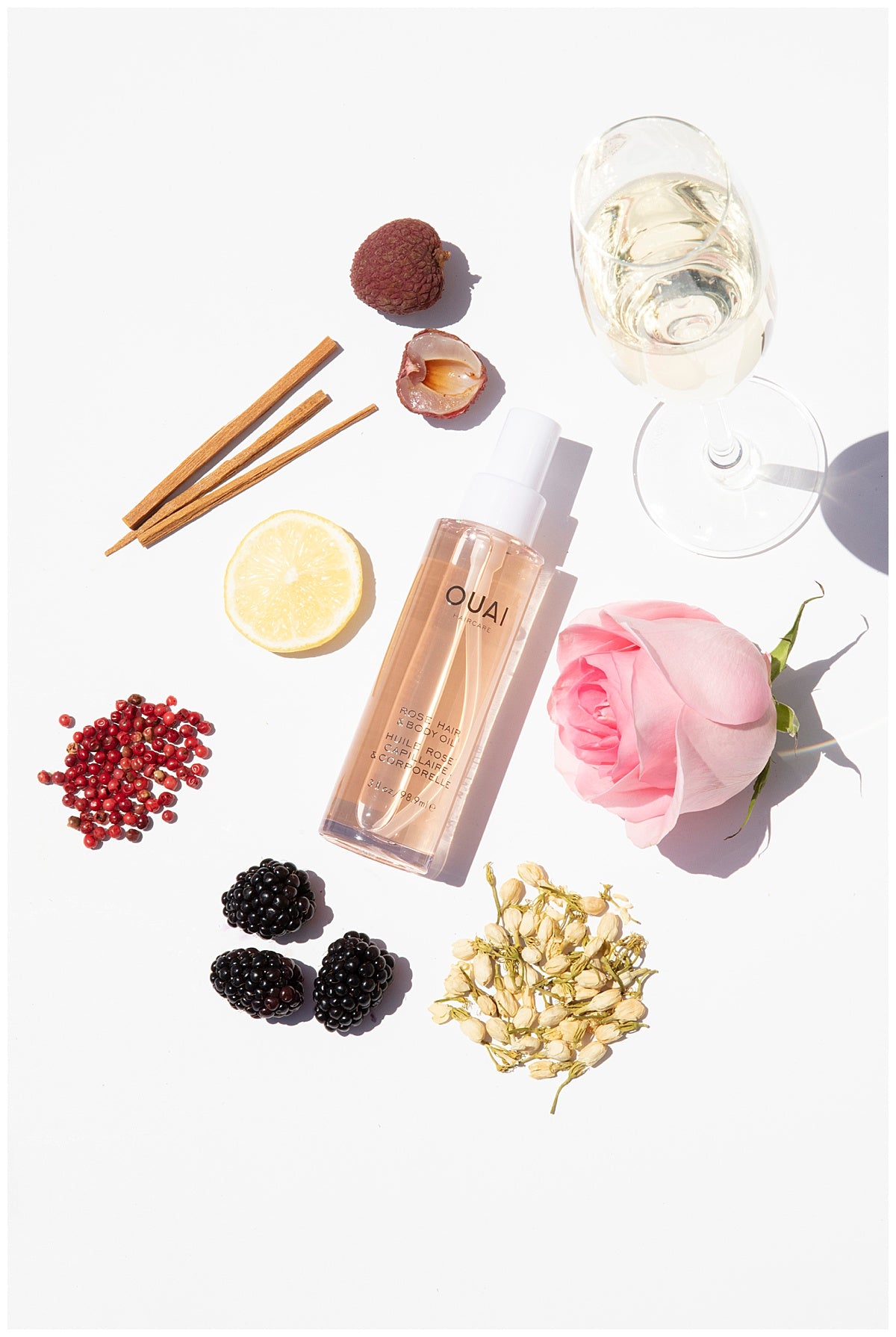 ouai rose hair and body oil tame frizz flyaways body oil hair oil