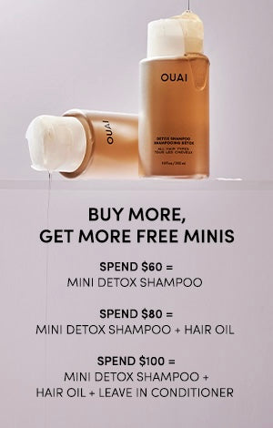 OUAI hair care products with promotional text on a light gray background