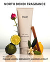 OUAI Curl Crème with floral and citrus elements on a light background