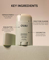 OUAI deodorant with labeled key ingredients on a beige background