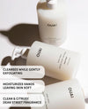 Three OUAI hand wash bottles arranged diagonally on a white background with text overlays describing product benefits and scent.