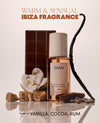 OUAI Ibiza fragrance mist with notes of vanilla, cocoa, and rum on a white background