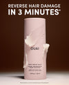 OUAI hair balm bottle with text on a brown background