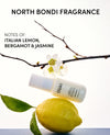 OUAI product with lemon and branch on a white background, featuring North Bondi Fragrance description.