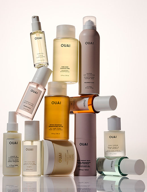 multiple ouai products stacked together on a white background