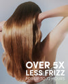 A woman shown from the back with long, glossy, straight brown hair. Large white text at the bottom reads 'OVER 5X LESS FRIZZ FOR UP TO 72 HOURS'.