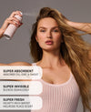 A woman with long hair holding a white spray bottle against her forehead. Three translucent text boxes on the left read: 'SUPER ABSORBENT ABSORBS OIL, DIRT & SWEAT', 'SUPER INVISIBLE BLENDS SEAMLESSLY', and 'SUPER FRESH VELVETY-RICH & ROSY MELROSE PLACE SCENT'.