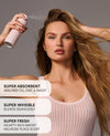 A woman with long blonde hair sprays her hair with a pink aerosol hairspray can. Three white text banners overlay the bottom left, highlighting product features: 'SUPER ABSORBENT', 'SUPER INVISIBLE', and 'SUPER FRESH'.