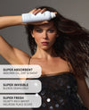 A woman with long dark hair holds a white spray bottle against her forehead. Three translucent text boxes on the left read: 'SUPER ABSORBENT ABSORBS OIL, DIRT & SWEAT', 'SUPER INVISIBLE BLENDS SEAMLESSLY', and 'SUPER FRESH VELVETY-RICH & ROSY MELROSE PLACE SCENT'.