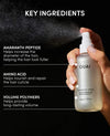 A hand holding a frosted bottle of OUAI Thickening Spray against a black background, with text highlighting key ingredients: amaranth peptide, amino acid, and volume polymers.
