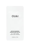 A small, white shampoo packet with the brand name 'OUAI' printed on the front and the text 'DETOX SHAMPOO' above and 'ALL HAIR TYPES' below. .