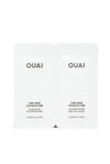 Two packets of Ouai fine hair shampoo and conditioner designed for travel, with white packaging and branding visible.